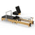 TWHEELS Pilates Reformer aus Ahornholz mit fünf Widerstandsfedern.