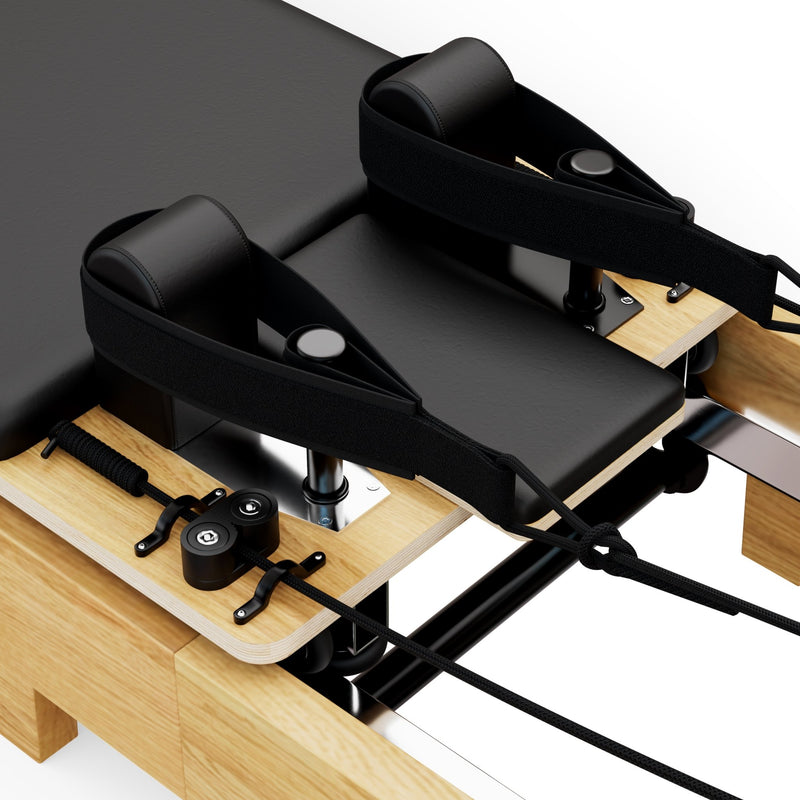 TWHEELS Pilates Reformer aus Ahornholz mit verstellbarem Widerstand.