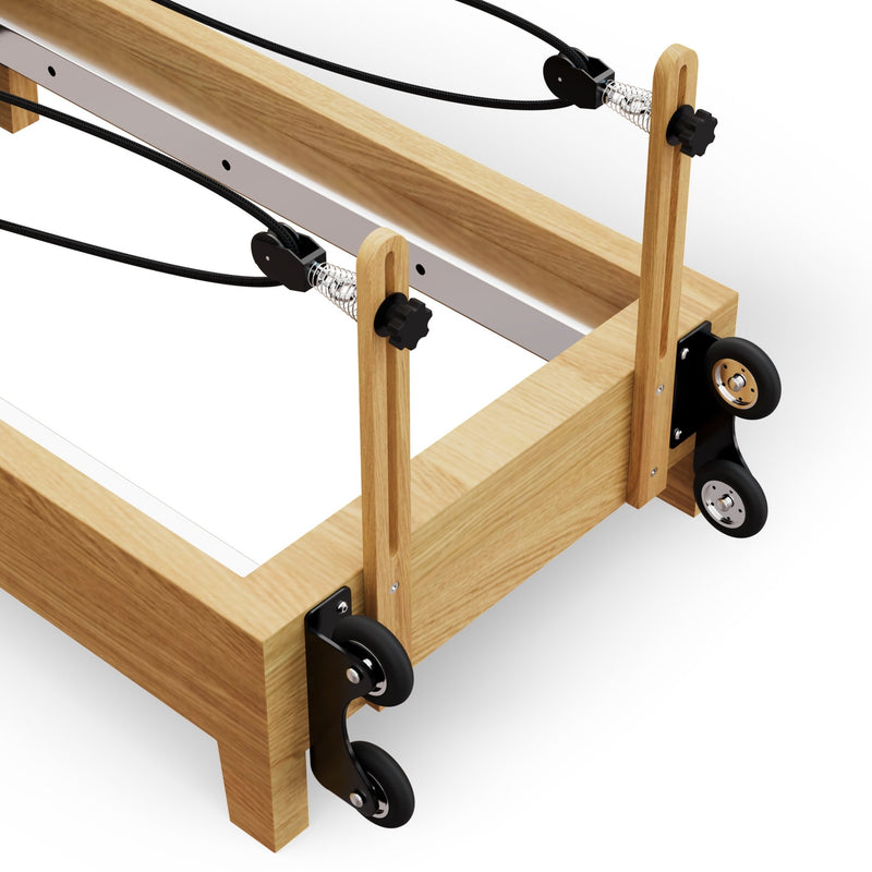 TWHEELS Pilates Reformer aus Ahornholz, platzsparend faltbar.