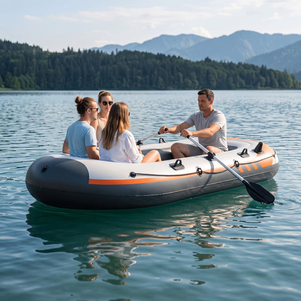 Vier Personen im grösseren TWHEELS Schlauchboot für 4 Personen auf einem Schweizer Bergsee